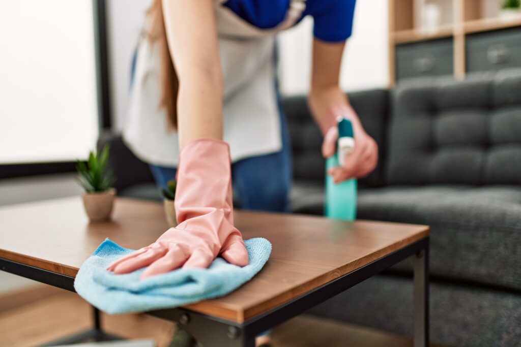 An image of someone cleaning their home before moving.